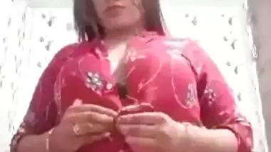 Sexy girl shows her boobs and ass to striptease her BF