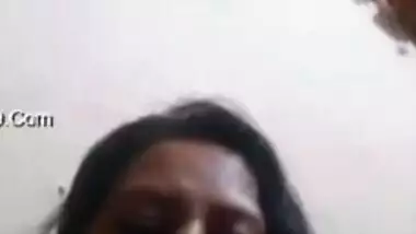 Desi mom simply sits in front of camera and talks with serious face