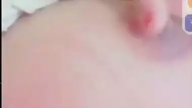 Smiling girlfriend video call to boyfriend shows boobs