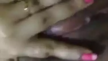 Adorable Indian girl with pink manicure spreads porn hole on camera