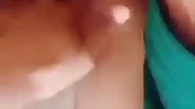 Horny girl squeezes her boobs and fingers her hairy pussy
