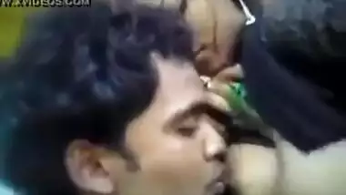 Outdoors boobs sucking session of a Muslim girl