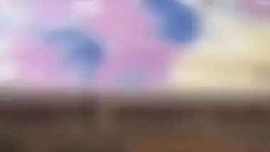 Desi mom with serious face sits before camera topless in solo sex clip