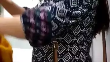 Plump lady big Boobs and cleavage in black bra in trial room