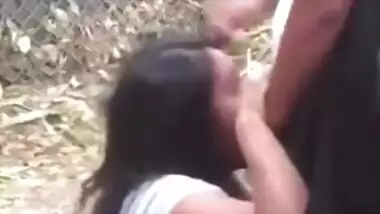 Young Indian college girl giving blowjob to uncle outdoor, new Desi viral mms