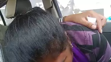 Telugu woman gives a desi blowjob to her man in a car