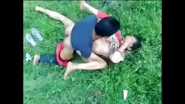 Bearded man penetrates an Indian MILF on green grass in outdoor porn