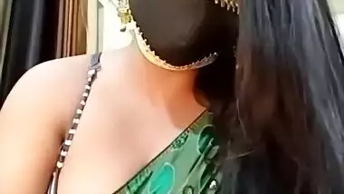 Young desi Bhabhi in saree milking her tits