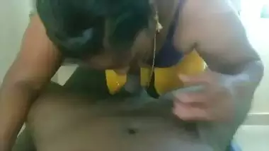 Man enjoys a Tamil blowjob from a big boob milf