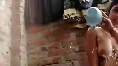 Village Bhabi Bathing Topless Showing Boobs