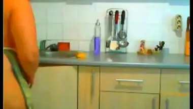 Nri chubby housewife in kitchen