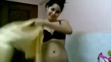 Bhabhi with tiny tits gets dressed in front of Desi hubby filming XXX porn