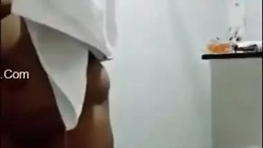 Pregnant aunty of Indian origin puts on clothes after taking a shower