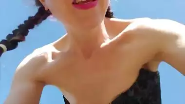 Black Dress, Nipple Clamps, and Buttplug Play Outside