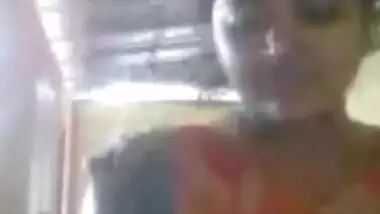 Aroused Indian shoves fingers into pussy and demonstrates her boobs