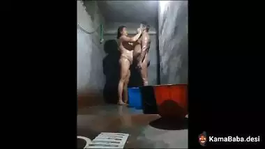 Village couple enjoy bathroom sex while bathing together